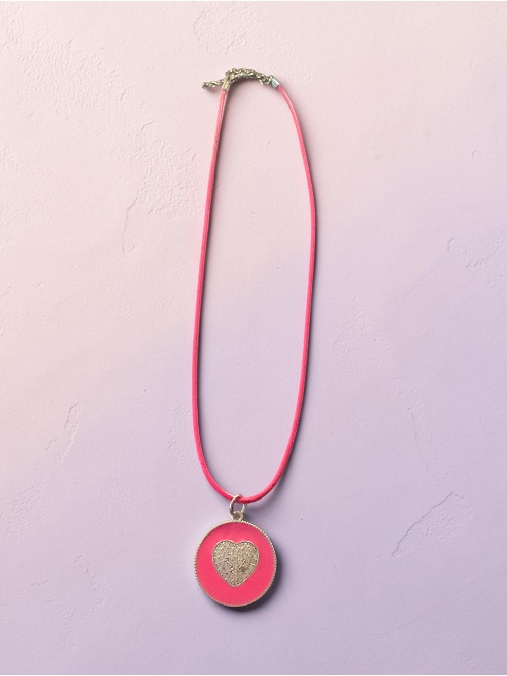 Pink Heart Pendant Necklace with pink leather cord.